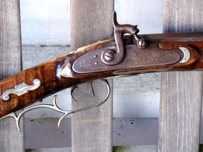 A spectacular 19th century Tiger-Maple Half-stock percussion Plains Rifle, unsigned, circa 1850